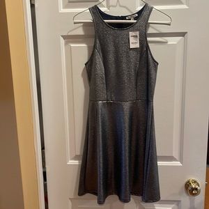 Brand new juniors silver homecoming dress size small.